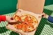 Satisfy Your Cravings with Orlando's Pizza or Deluxe Meal for 4: Includes Pizza, Sides & Drinks (Up to 44% Off) - Image 2
