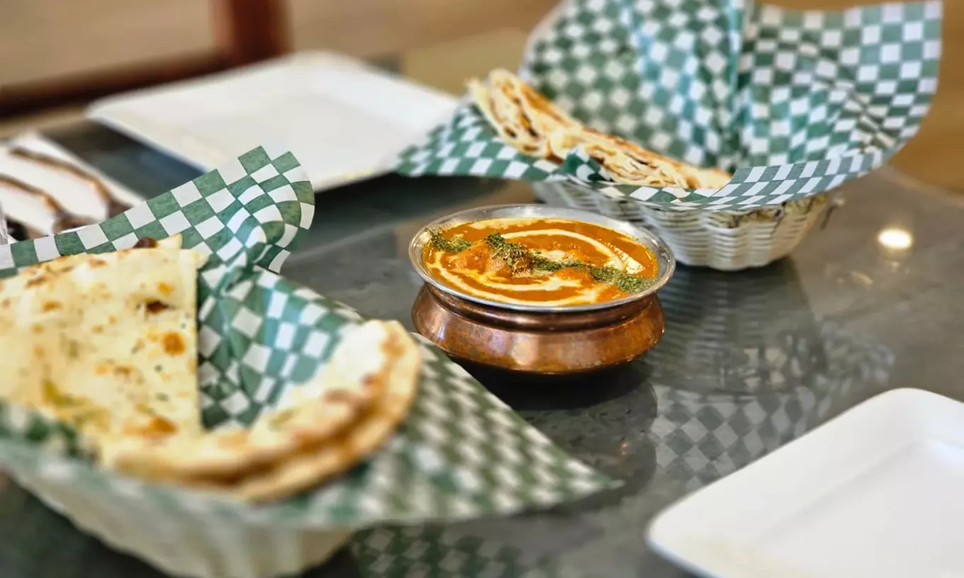 Authentic Indian Cuisine for Two, Four Person or Dining Credit
