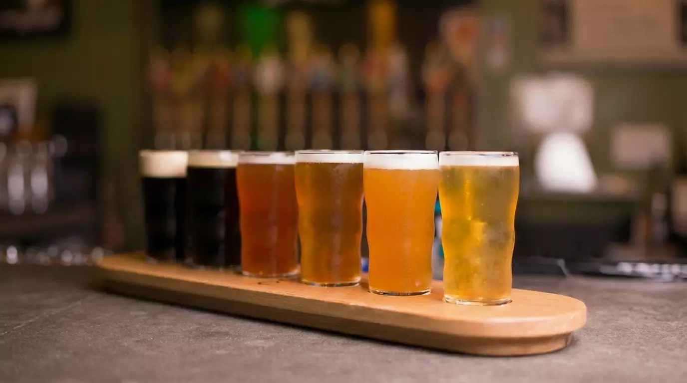 Innovative Brews & Delicious Food with Beer Flights, Pints, Wings, Pizza, or Take-Home Beer (Up to 32% Off) - Second Medium