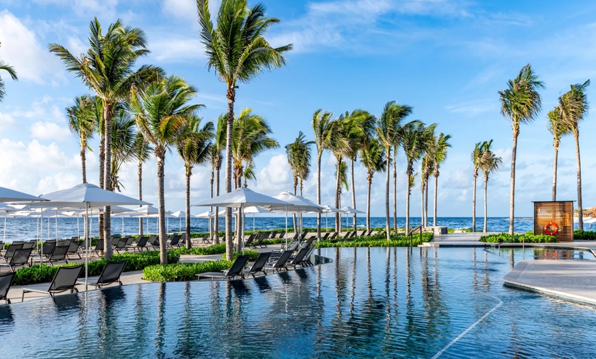 Image 1: ✈4-Day 5* Hilton Tulum Resort Stay with Air from Great Value Vacations