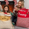 Image 5: Surprise loved ones with a festive, Personalized Santa Delivery Bag