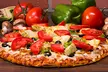 Large/Specialty Pizza, Wings, Beer/Wine, Drinks, $50 Credit, or More at Mountain Mike’s Pizza (Up to 22% Off) - Second Medium