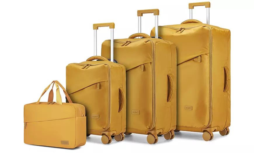 Image 3: Set de 3 maletas con diseño resistente al agua y bolsa de mano a juego