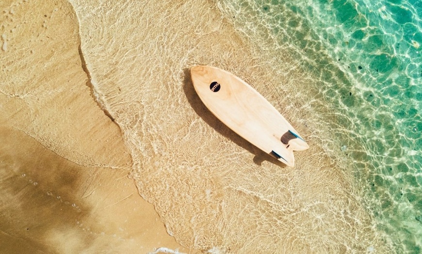 Image 2: Steps from Waikiki Beach and Free Surf-Board Credits Each Day