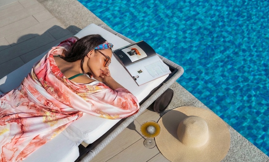 Image 3: Lunch or Dinner w/ Pool Access & 2-Hour Beverages for Child or Adults