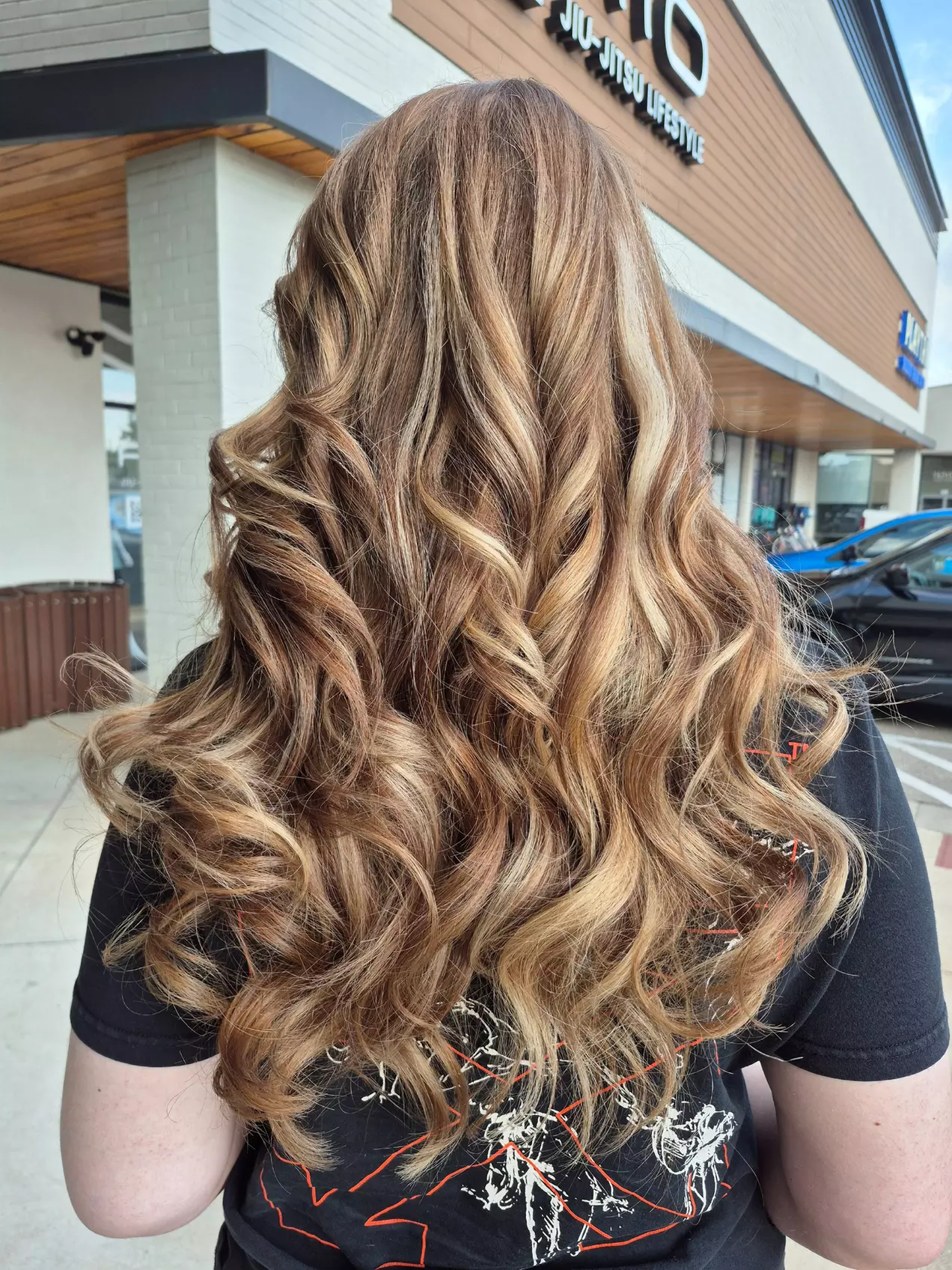 Transform Your Tresses: Haircut, Blow-Dry & Highlights — Up to 54% Off