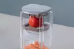 Press-Type Vegetable Chopper with Four Interchangeable Blades and Storage Container - Image 3
