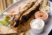 Indulge in a 15-Course Greek Meze Experience for Up to 4 at Bouzouki By Night with Optional Wine
(Up to 33% Off) - Second Medium