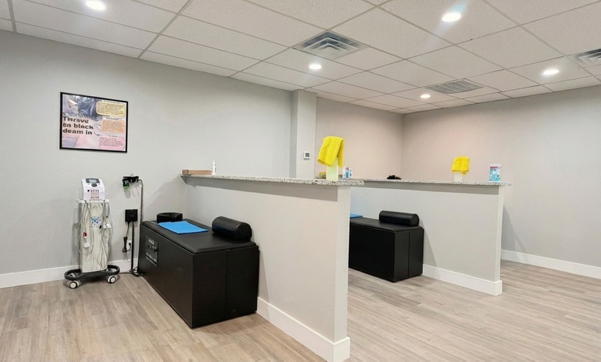 Image 2: Chiropractic Exam, Adjustment, and Therapy Sessions
