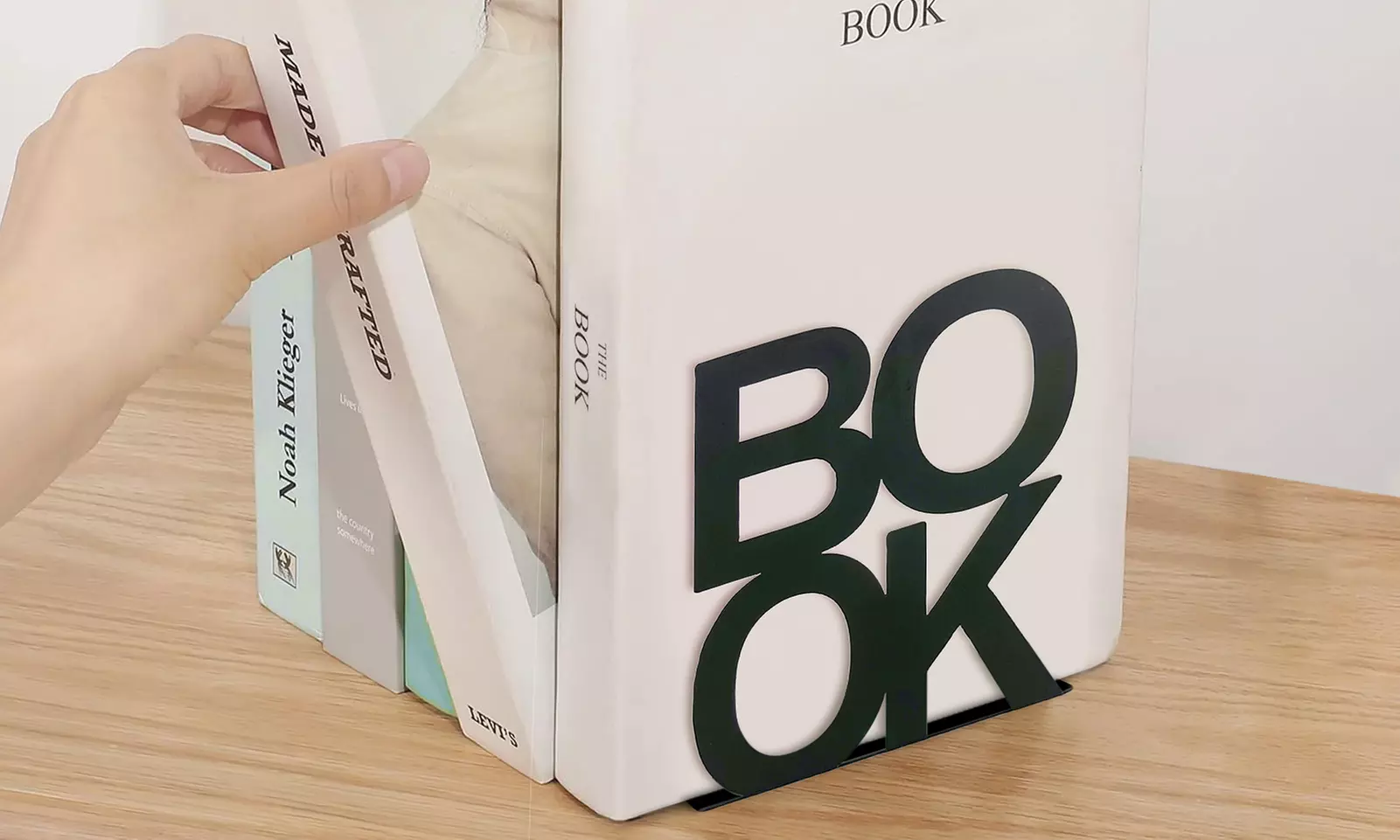 Coppia di fermalibri da mensola