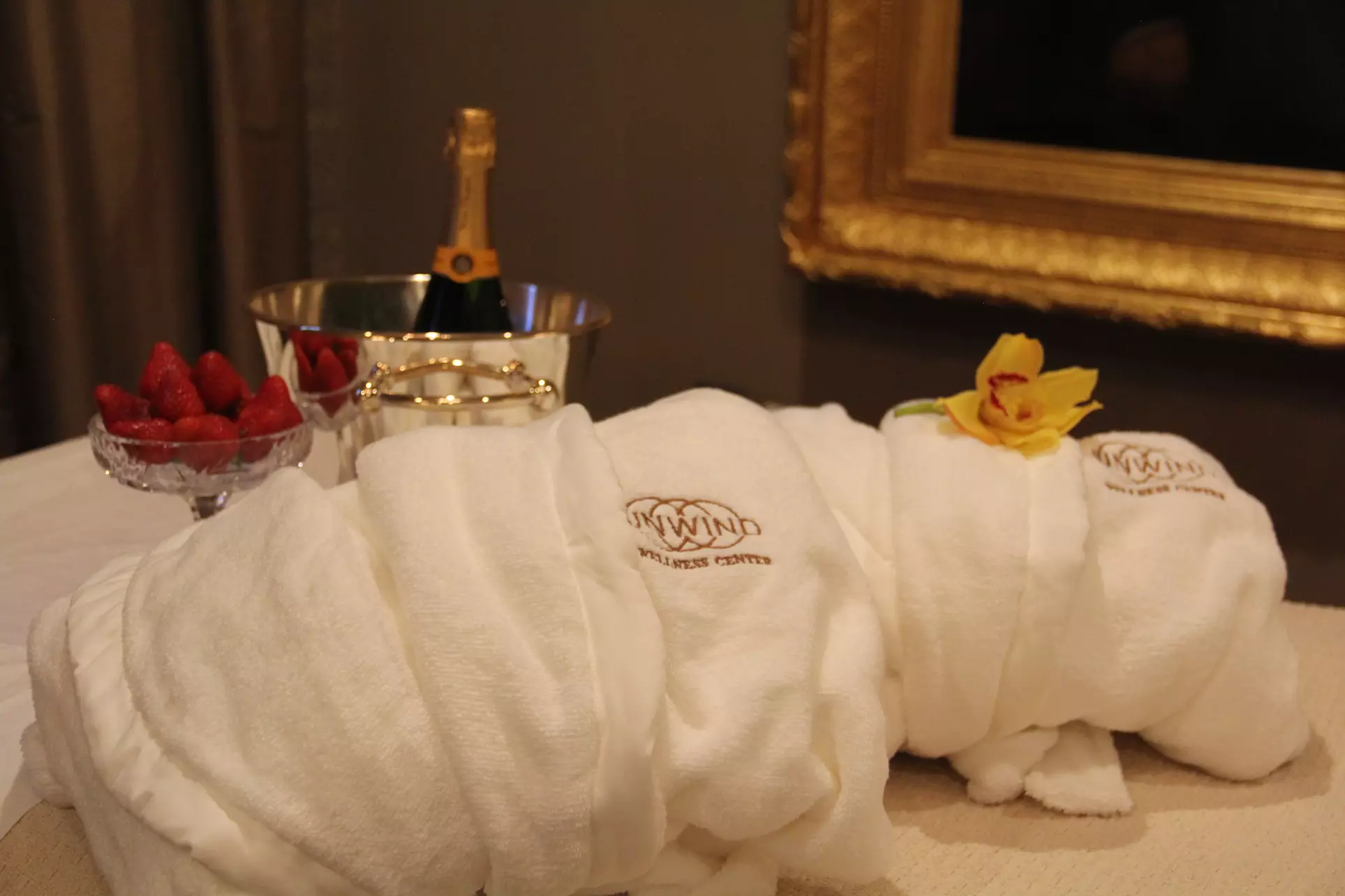 $156 for 60-Minute Couples or Four-Hands Massage with Champagne at Unwind Wellness Center ($210 Value) - Second Medium