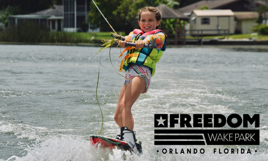 Image 1: Catch Waves with Exclusive Wakesurfing or Waterboarding Lessons