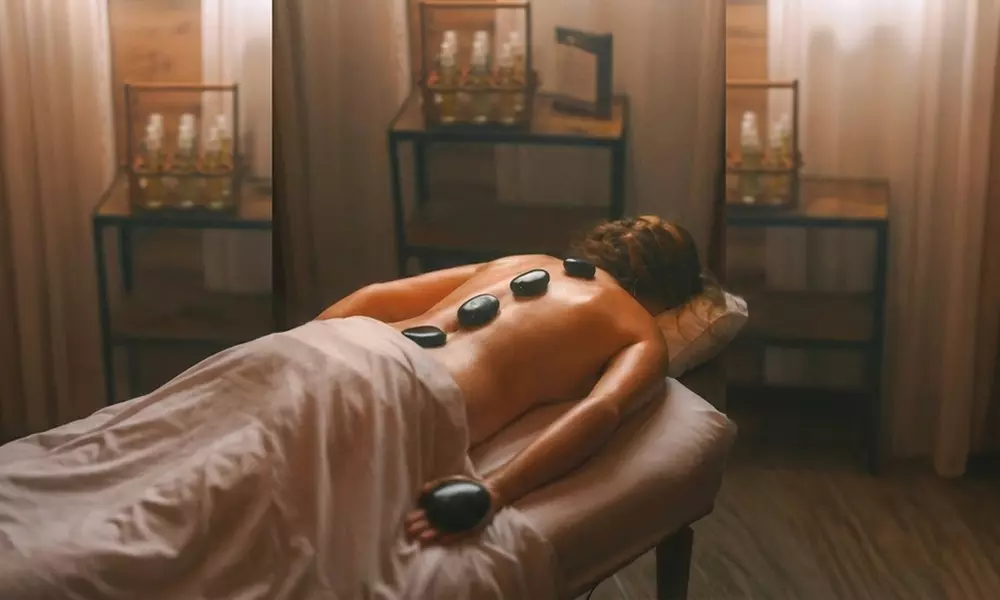 Massage Pro Offers One or Two 60 Minutes Swedish or Deep Tissue with Hot Stone Massages (Up to 46% Off)