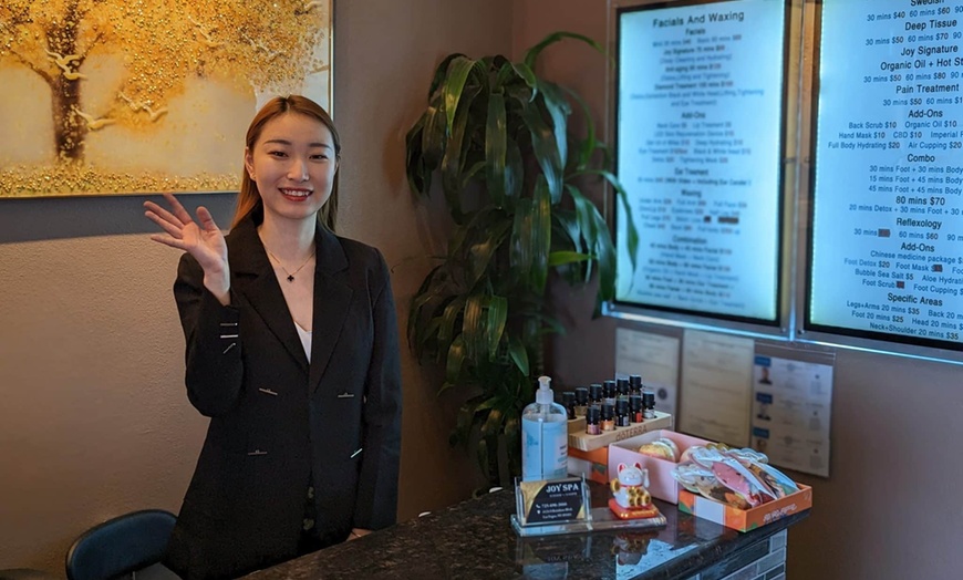 Image 2: Get a Soothing 60-Minute Full-Body Massage with Hot Stones for Two!