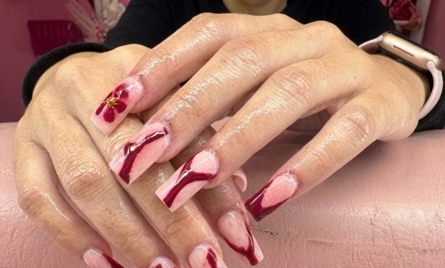 Image 3: Classic Manicure, Pedicure, or Mani-Pedi with Hot Towel & Massage