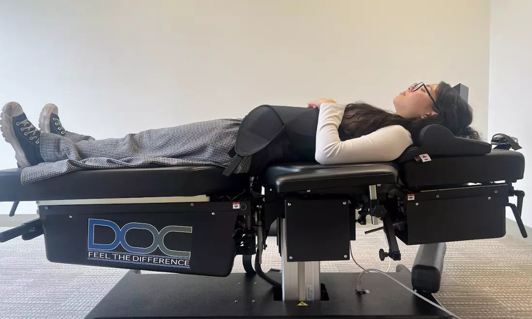 1 or 1.5 Hr Non-Invasive Spinal Decompression with Chiropractic Consult or Therapeutic Massage (Up To 60% Off)
 - Primary Image