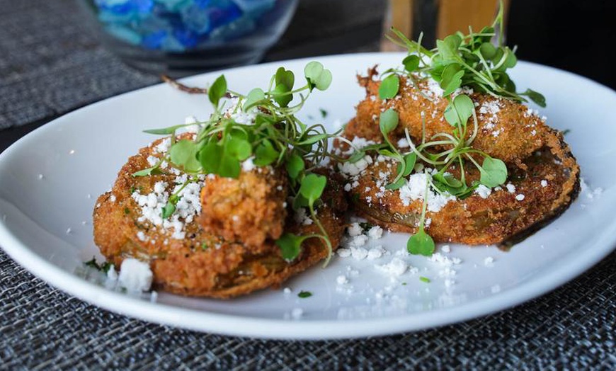 Image 16: $50 Dining Credit