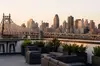 Bar Bites & Cocktails with Panoramic NYC Skyline Views for 1, 2, or 4 at Skybar Rooftop & Lounge (Up to 33% Off)