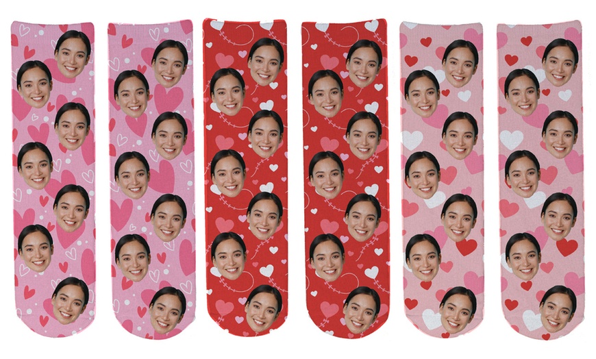 Image 1: Get fun with Love Theme Novelty Face Socks  for One or Two