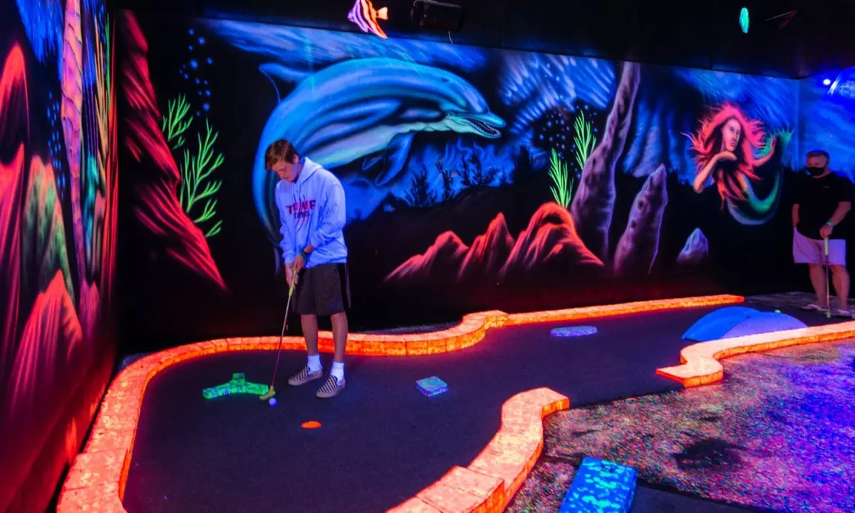 12 Holes of Glow in the Dark Mini Golf with 3D Artwork!