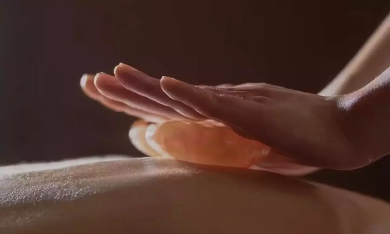 Couples & Hot Stone Aromatherapy Massages — 60 or 90-Minute