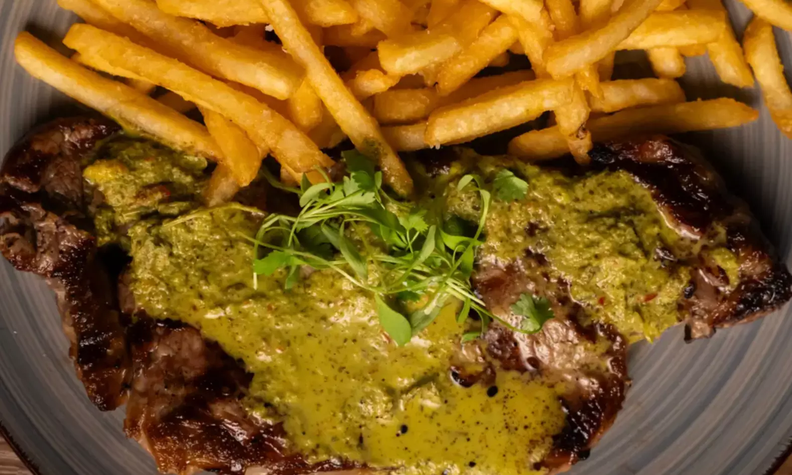 Savor a 2-Course Chef-Driven Dining Experience with Cocktails for Two or Four, or Dining Credit (Up to 60% Off)