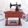 Image 1: Vintage Simulated Small Sewing Machine Model Music Box
