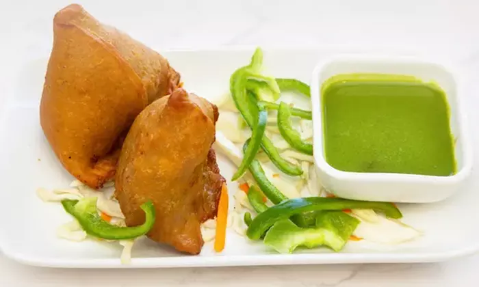 $25 or $50 Toward Food and Drink Or Dinner with Drink for Two/Four