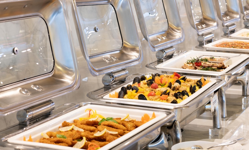 Image 3: Experience a Delicious Dinner Buffet with Drinks at an Iconic Venue