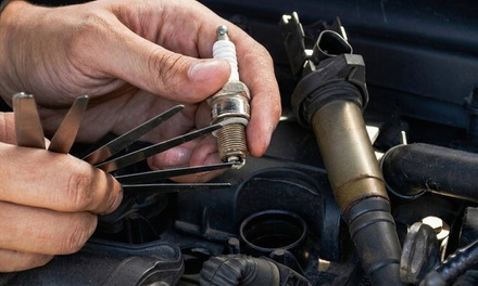 Tune Up & 4 Cylinder Spark Plug Replacement with Oil Change & Filter Replacement - Sully s Auto Repair