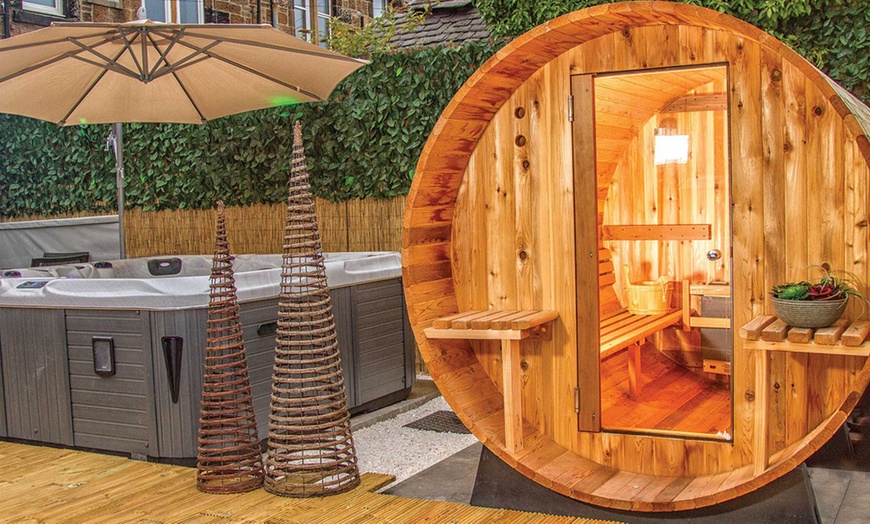 Image 1: Relax w/ Two Treatments for 1 or 2 or Full Spa & Lodge Access for 2