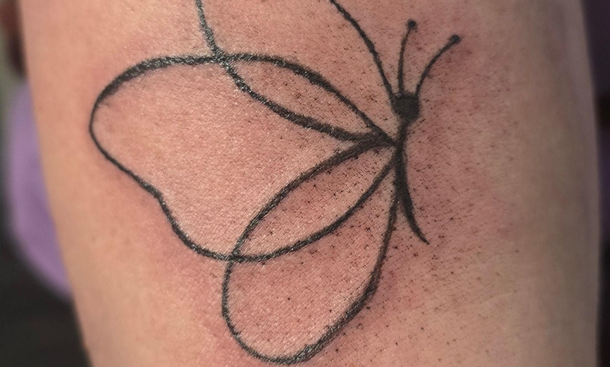 Image 12: Explore Diverse Small, Medium, or Large Fine Line Tattoos Options