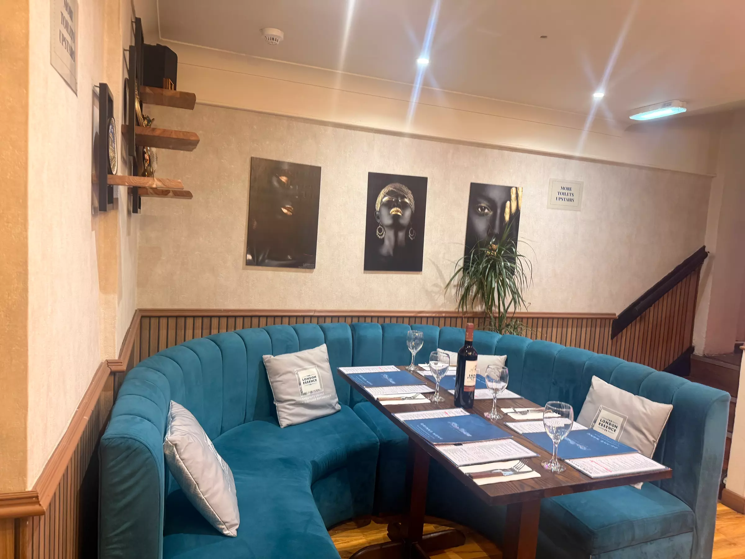 Savor Delicious Steak with Fries, Salad, Sauce and a Glass of Wine