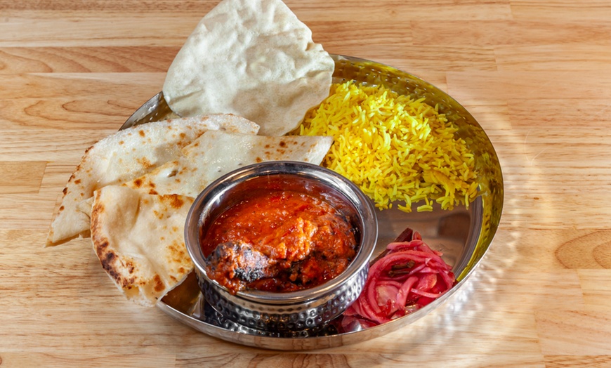 Image 9: Get $50–$150 Toward Food & Drinks at Me & Yogi Indian Kitchen
