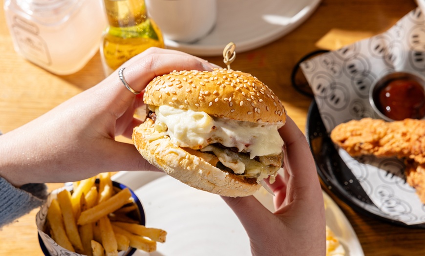 Image 2: Burgers, Pizzas, Tapas or Boozy Brunch at Revolution Bars!