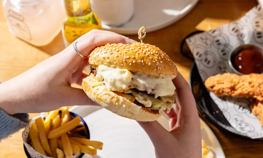 Image 2: Burgers, Pizzas, Tapas or Boozy Brunch at Revolution Bars!