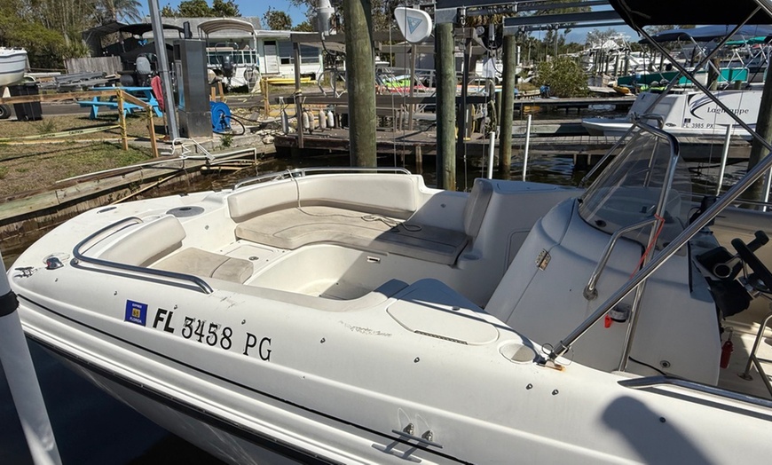 Image 3: Enjoy Relaxation and Fun with a Hurricane Deck Boat Rental! 