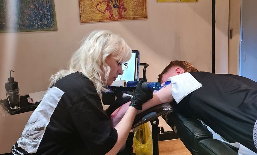 Image 1: Transform Your Skin with a Palm Size Tattoo or Day Session