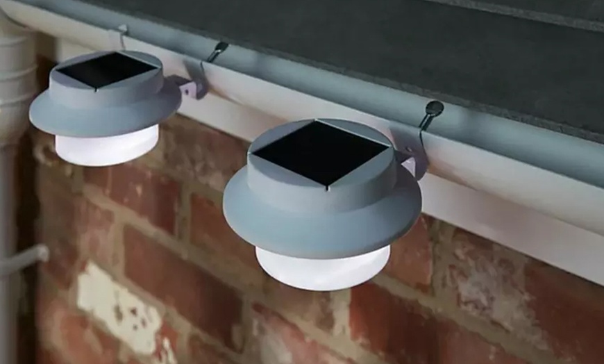 Image 2: Brighten Your Space: 2, 4, or 8 Solar Fence Gutter Lights: White/Black