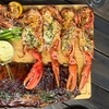 Image 1: Surf & Turf: Whole Lobster, Ribs & Seafood Platter with Bottle of Wine