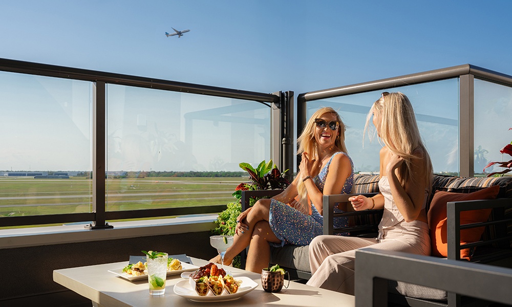 Dining with Runway Views: $50, $75, or $100 Towards Food & Drinks 
