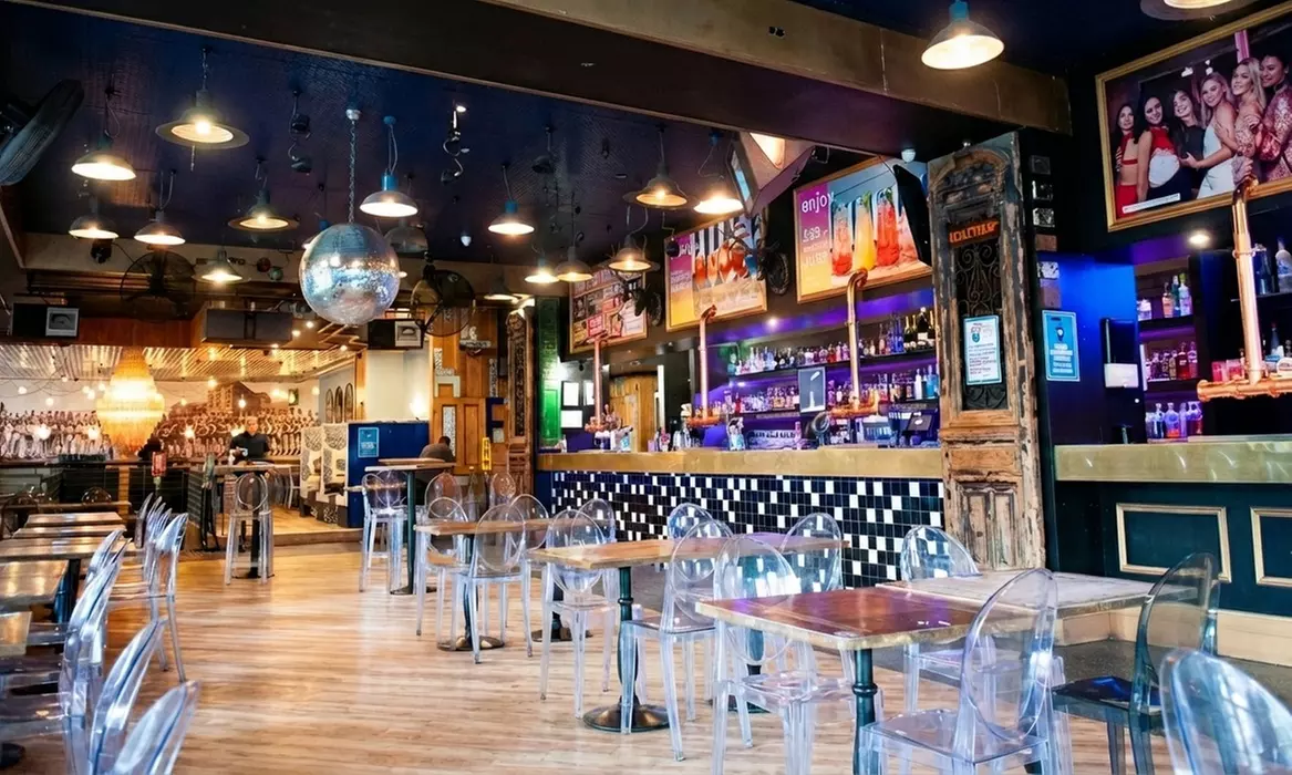 Experience 1920s Speakeasy Vibes with $150 or $250 Food & Drink Credit