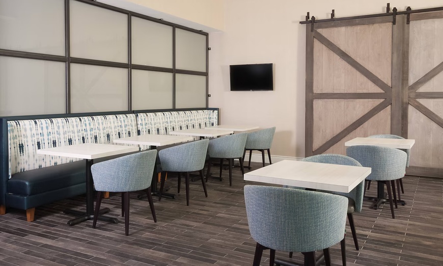 Image 13: Spacious suites, free breakfast, pool, and easy access to beaches