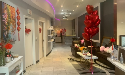 50-Minute Swedish or Deep Tissue Massage with Essential Oils and Hot Stones - Luxe Day Spa