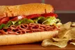 Large/Specialty Pizza, Wings, Beer/Wine, Drinks, $50 Credit, or More at Mountain Mike’s Pizza (Up to 22% Off) - Second Medium