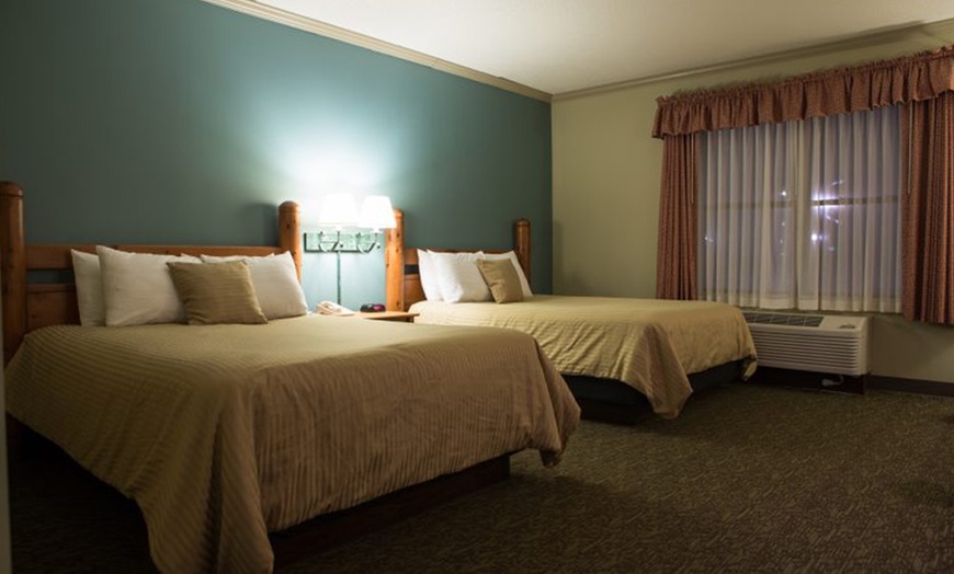 Image 2: Steps from the Coasters: Lodge Stay at Six Flags Darien Lake