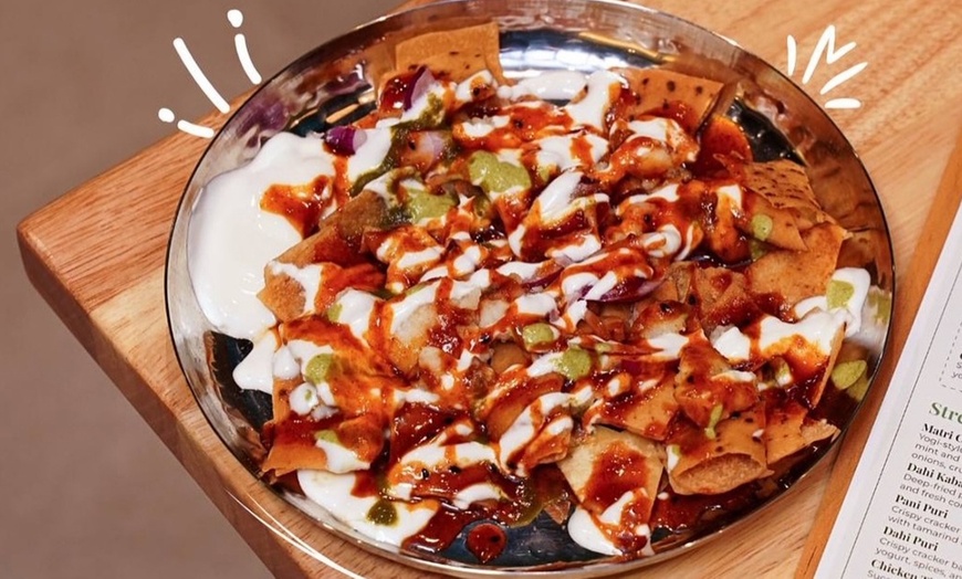 Image 4: Get $50–$150 Toward Food & Drinks at Me & Yogi Indian Kitchen
