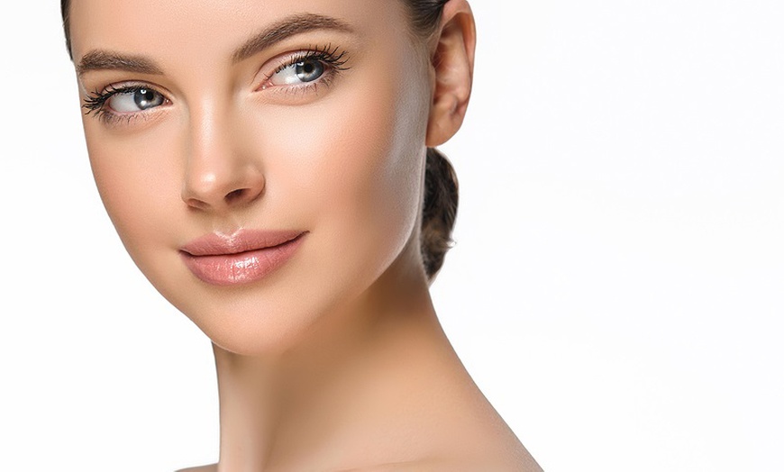 Image 2: DiamondGlow Facial or Microdermabrasion and Light Peel Combo Treatment