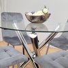 Image 2: Round Clear Glass Dining Table with Chrome Legs and Four Velvet Chairs