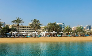 Unwind in luxury Pool and Beach Access:Child (AED 50), Adult (AED 100)